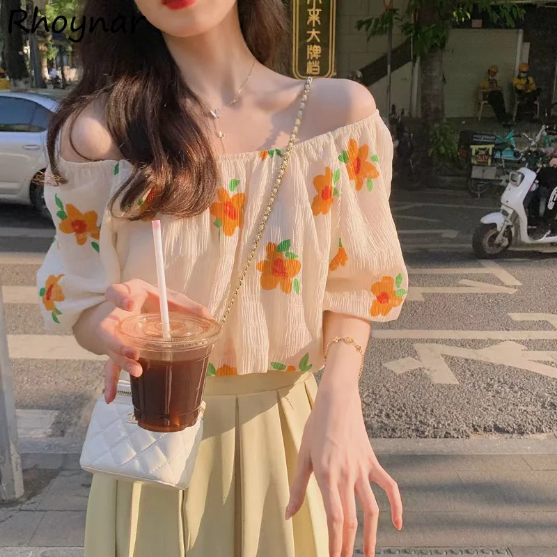 חולצות נשים נטוי הצוואר הקיץ החדש הסקסי פאף שרוול עליון כל-התאמה פרחוני אופנה בגדי יומי Harajuku מכרז נפוצות