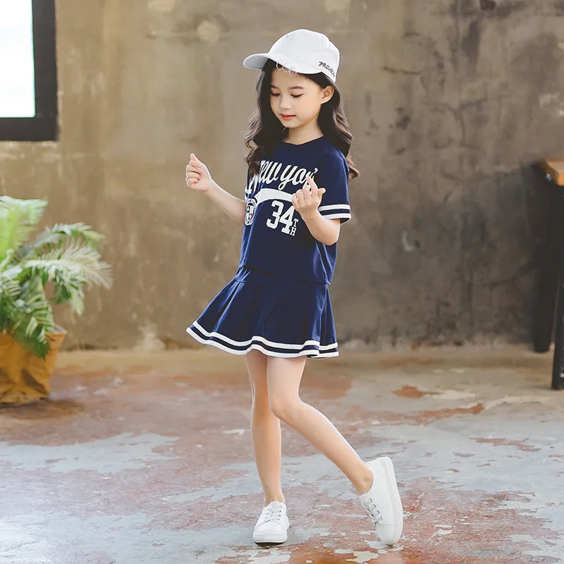 קוריאני בגדי ילדים נוער בנות חליפת קיץ בייסבול המדים מכתב להדפיס חולצות עליון + קפלים החצאית 2pcs JK תלבושות